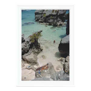 On the Beach in Bermuda 1967 by Slim Aarons Framed C Print