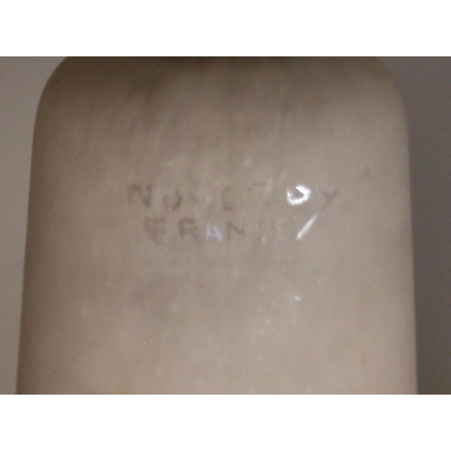 This pending light with a geometric motive in its fixture was produced by famous “Noverdy” company in France in the 1920s....