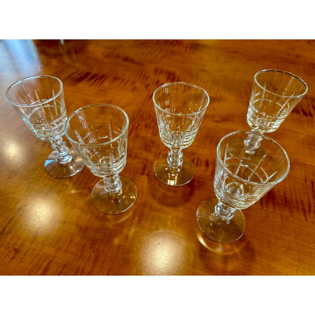 This charming set of five small crystal wine glasses is perfect for serving port, sherry, or smaller pours of wine....