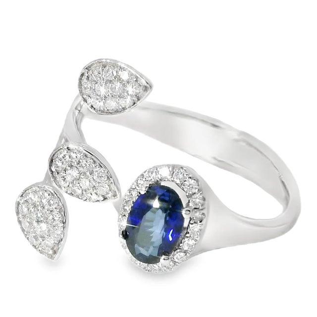 18K White Gold Diamond Filigree Band. This stunning piece features 48 brilliant round white diamonds, totaling 0.3 carats,...