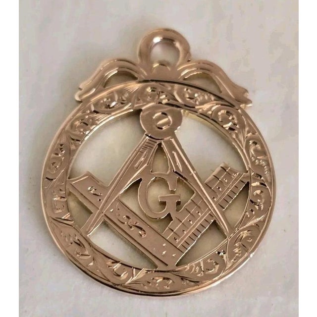 A fine antique Masonic fob or pendant crafted in 9-carat rose gold by William Oakley Davis and fully hallmarked in...