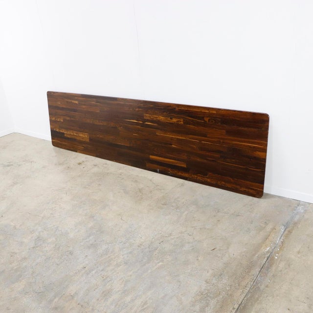 Circa 1970. We offer this headboard designed by Don Shoemaker. Made in cocobolo wood.