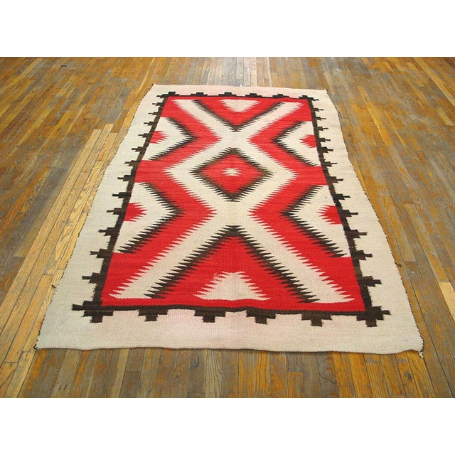 Antique Navajo Hallway Runner Wool Ivory Rug, Circa Date: 1920s. This exceptional weaving represents the peak of early...