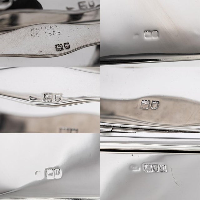 Antique 20th Century Edwardian solid silver cigar box. Finely crafted, it features a curved central handle and two hinged...