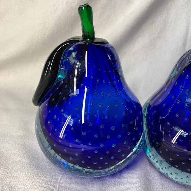These are vintage Murano cobalt blue art glass pear decorative figurines/bookends featuring a controlled bullicante bubble...