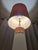 A sensational 1960s Mid-Century Modern atomic ceramic table lamp. This striking sculptural piece features a heavily...