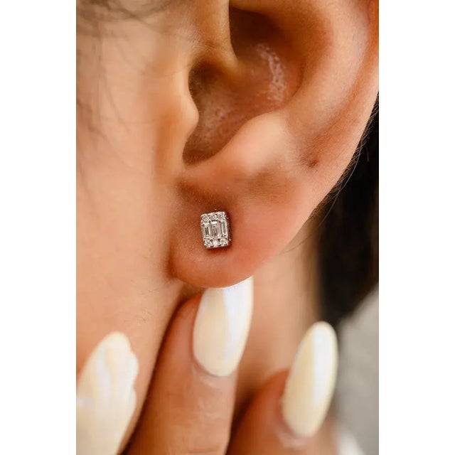 This is part of Chairish’s Fine Jewelry assortment. Dainty Diamond Illusion Pushback Stud Earrings in 18K Gold to make a...