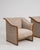 A coordinated pair of armchairs inspired by Art Deco design, featuring clean geometry and structured silhouettes. The...