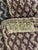 This twin bed overshot coverlet has a blue and purple woven pattern. Hand woven tag reads 1927. It seems the blue was used...