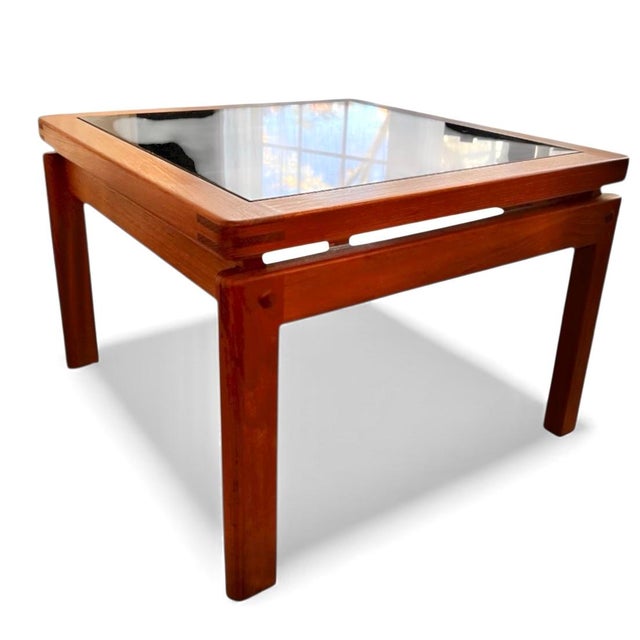 This pair of Danish Modern side tables exemplifies the refined proportions and craftsmanship associated with Scandinavian...