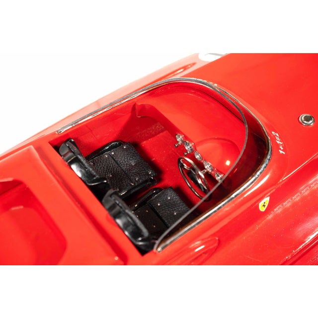Ferrari Freccia Rossa speed motorboat is a very rare vintage decorative object handcrafted in mahogany wood, metal and...