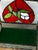 Vintage leaded, footed, stained glass trinket box with green velvet lining.