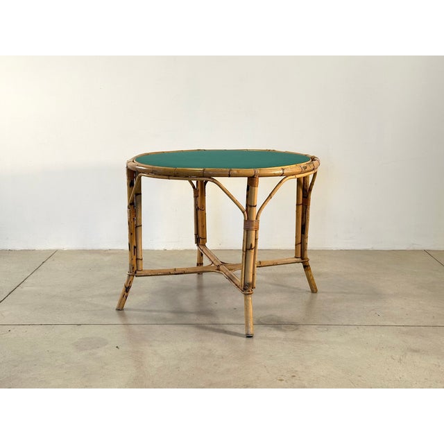 1970s bamboo game table, double-sided removable top, one side is lined with green cloth and the other is veneered in Formica