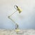 A vintage mid century cream Anglepoise model 1227 desk lamp designed by Herbert Terry. This model was was manufactured by...