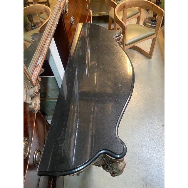 Black stone top! Dimensions: 46” W x 32” H x 17.5” D