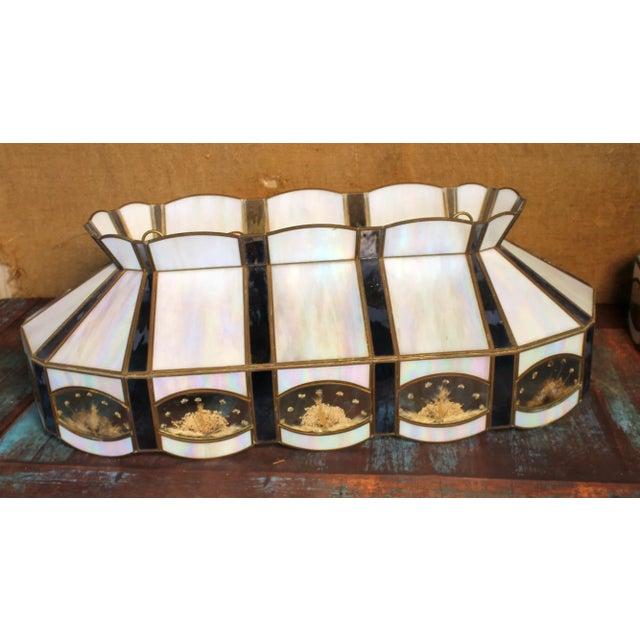 I’m not a fan of using subjective adjectives when describing the things I offer for sale, but with the iridescent slag...