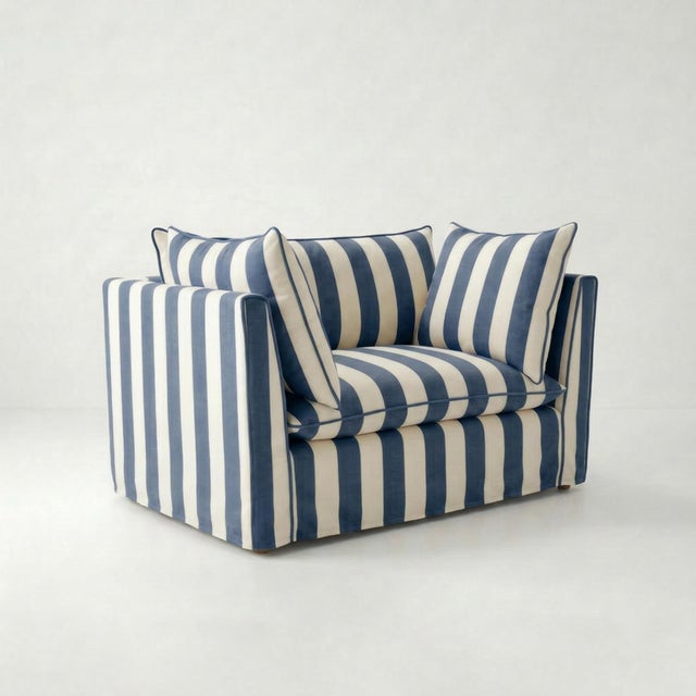 A joyous beautiful loveseat made by hand in the USA using natural materials with a large dollop of comfort. 'Tradition...