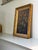 Beautiful dark atmospheric painting of four sunflowers. The back of the board on which the flowers are painted reads, "F....