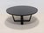 This custom-built round dining table features a striking architectural cross-brace base similar to Antonio Citterio’s...