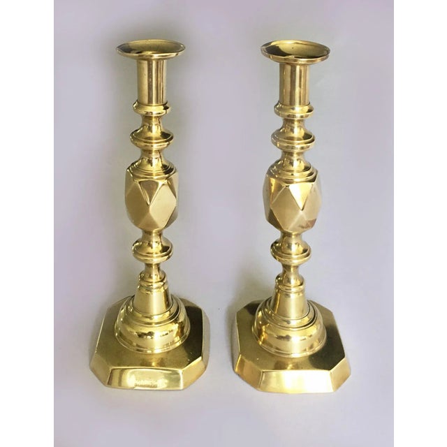 Pair “The King of Diamonds” cast brass candlesticks with square base, clipped edges, a large center knop with namesake...
