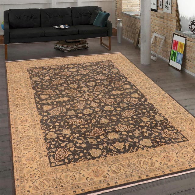 Crafted by skilled artisans using time-honored weaving traditions, this antique low pile handmade wool rug embodies the...