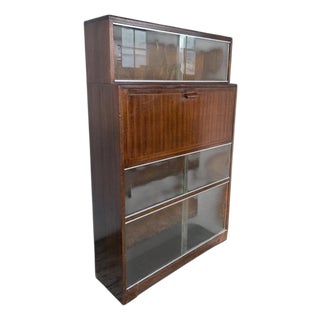 Mid-Century Stacking Bookcase with Drop Front Bureau and Glass Sliding Doors For Sale