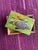This adorable box of enamel over copper inlay top with a wood frame and cork interior is by Annemarie Davidson of a pair...