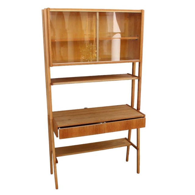 A beautiful set of a bookshel, writing desk and chair for your study room.