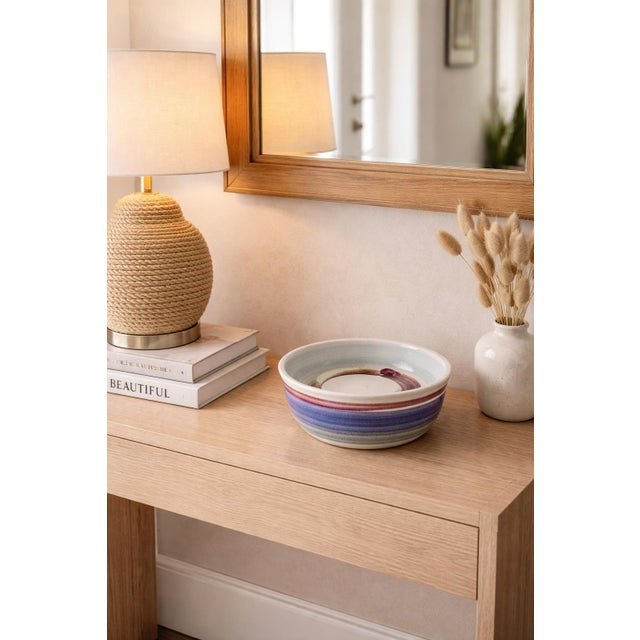 Mobile-Ready Description A beautifully hand-thrown studio pottery bowl by Klein Art, featuring a soft white interior with...