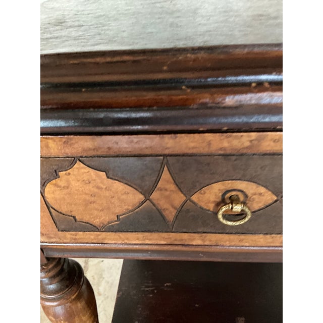 A charming Abernathy Cabinetmaker side table, likely circa 1920s–1940s, featuring hand‑turned legs, a lower stretcher...