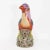 A striking vintage Chinese porcelain bird figure, hand-painted in vivid enamels with finely detailed plumage in shades of...