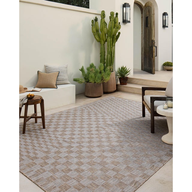 Inspired by the scenic mountain town in California, the Topanga Collection is an indoor/outdoor rug made of durable...