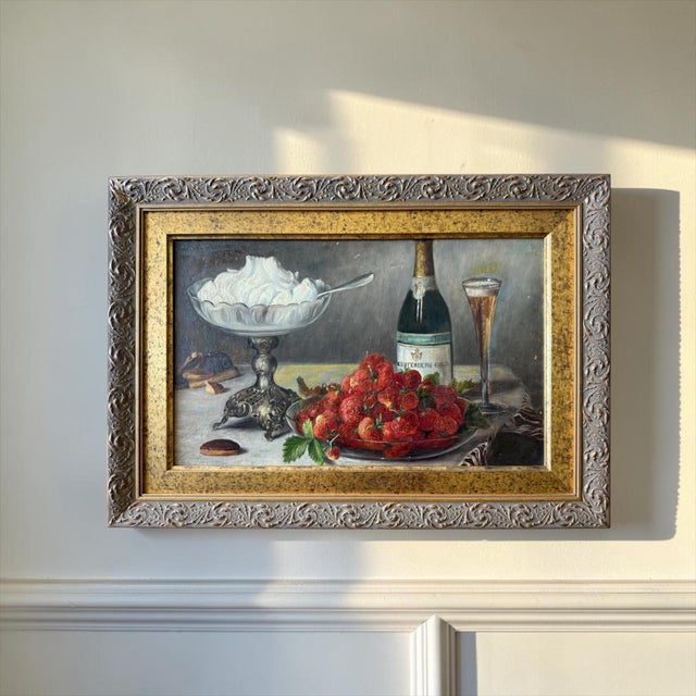 A charming and richly detailed still life by German artist M. Heller Hermann (born 1897) depicting an elegant tabletop...