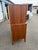 **This piece has been professionally refinished! Super clean condition Mid-Century Modern walnut and rosewood two doors...