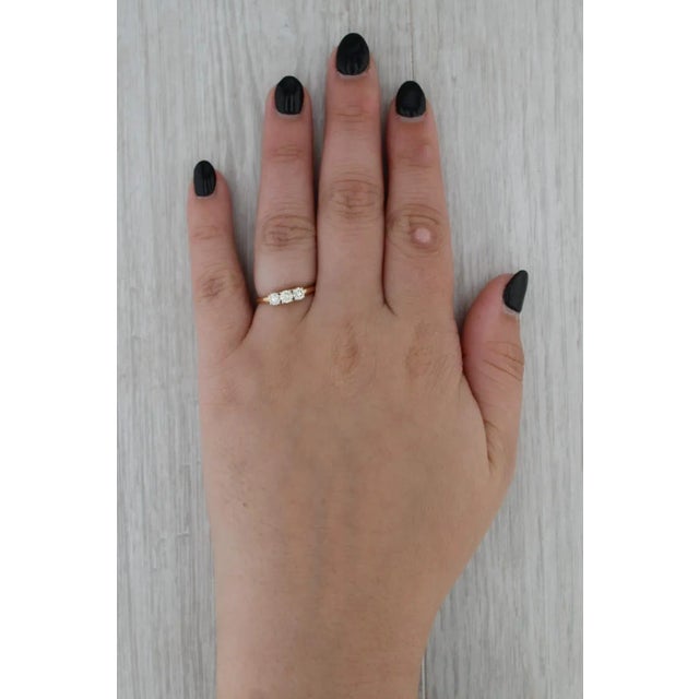 This piece comes with a Tomas Rae certificate of authenticity. Gemstone Information: - Natural Diamonds - Total Carats -...