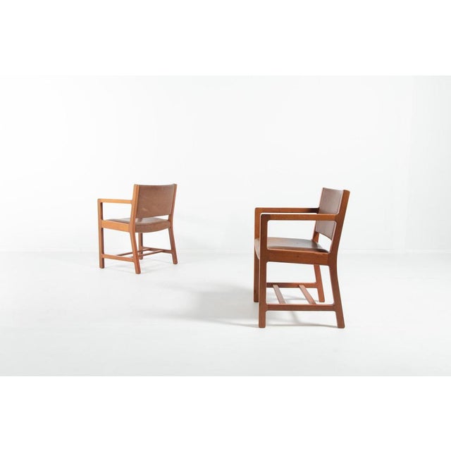 A set of two armchairs designed by Børge Mogensen in Denmark for Søborg møbelfabrik. 1960s. Chairs have a solid teak frame...