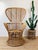 Vintage 1960s Rattan Chair made of rattan natural color tall fan back "peacock" style in the style of gio ponti Great...