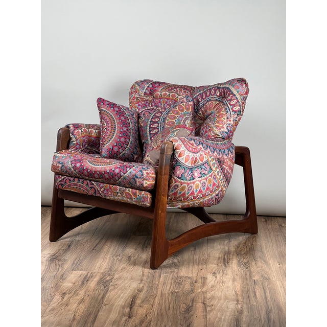 This Vintage Mid-Century Modern Adrian Pearsall for Craft Associates Walnut Wingback Chair, crafted circa 1970, is a...