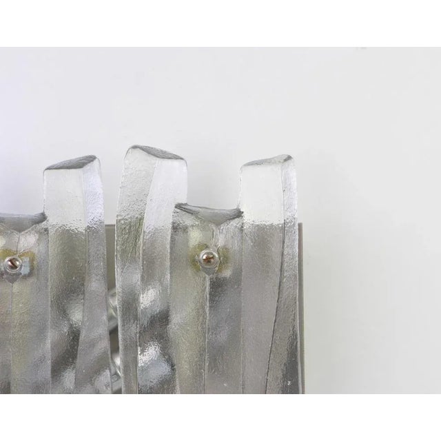 Wonderful pair of midcentury wall sconces with ice glass, made by kalmar, austria, manufactured, circa 1960-1969. Serie:...