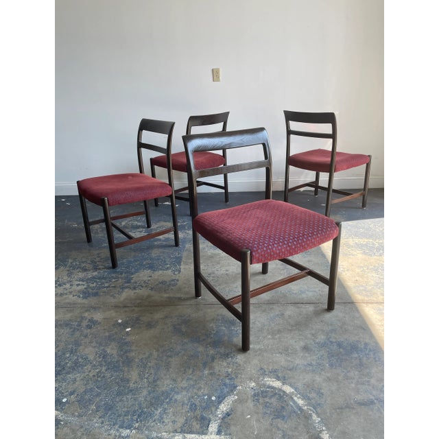 Wonderful set of four side chairs designed by Roger Sprunger for Dunbar in a dark stained Ash. Would work well in a...