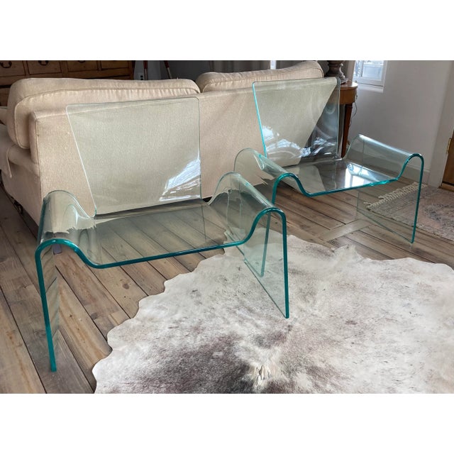 Pair of Acrylic Lucite Lounge Chairs. In near perfect condition, these chairs have been gently used. The graceful curves...