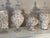 22” large glass jars filled with White Sea shells. Sold per piece.