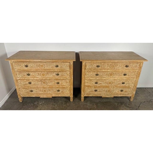 A handsome and well-matched pair of late 19th century Swedish Gustavian chests of drawers, crafted in pine and retaining...