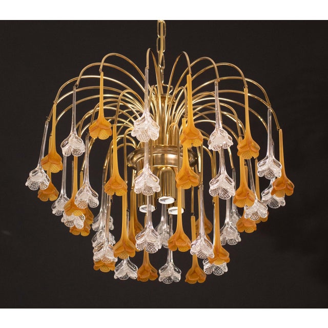 Gorgeous Murano chandelier in the style of Venini La Cascata. The chandelier consists of three rounds composed of...