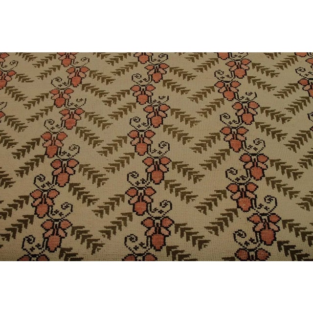 Originating from China in 1960, this vintage Sparta design wool rug employs a very uncommon contrast through color and...