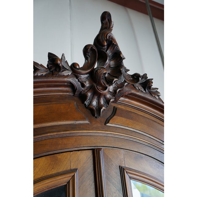 Antique French Rococo 2 door Armoire. Louis XV styling in remarkable condition considering its considerable age. A lovely...