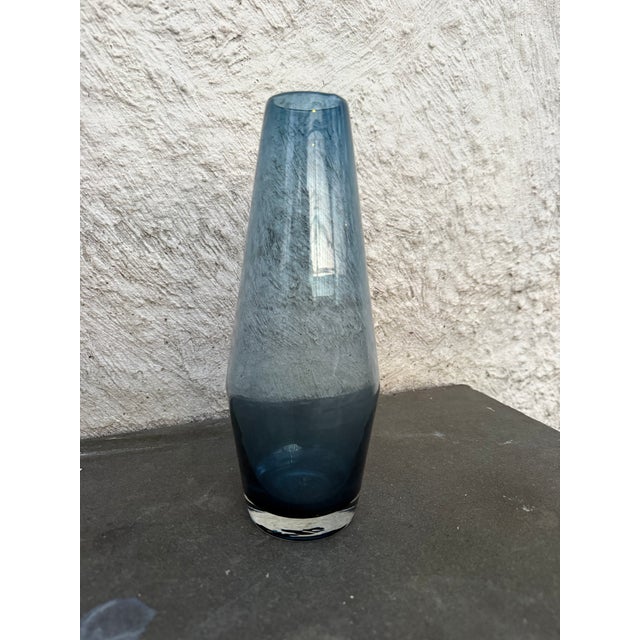 Tapered blue color glass vase manufactured by in Riihimaen Lasi Oy, Finland. The vase is not marked.