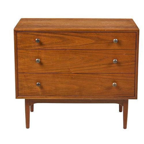 Mid Century Modern walnut chest of drawers, designed by Kipp Stewart (American, 1928-2022) for Drexel Furniture's...