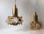 - A pair of small crystal and gilded brass pendant lights - Manufactured in Denmark by Vitrika or Sommer during the 1970s...