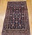 "This vintage Persian Malayer area rug from the early 20th century showcases a highly sought-after allover geometric...